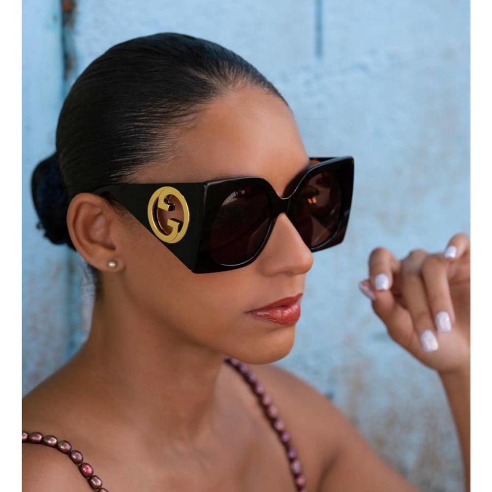 Stylish Black Sunglasses with Gold Accent